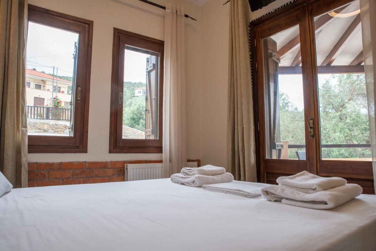 Symmetron Suites Каламос Экстерьер фото